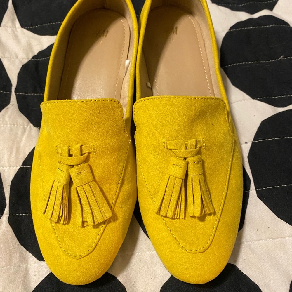 Gold faux suede tasseled loafers